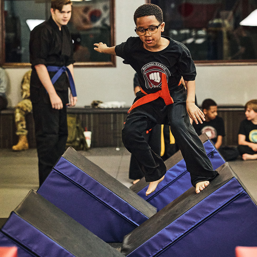 student on obstacle course