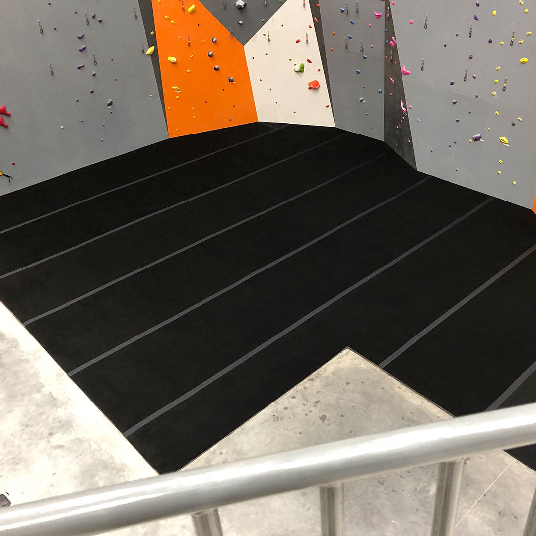 Carpet bonded foam by climbing walls